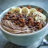 Chunky Monkey Smoothie Bowls featuring a rich chocolate base and generous hemp seed toppings.
