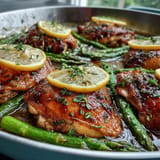 Juicy one-pan lemon herb chicken and asparagus roasted to perfection.